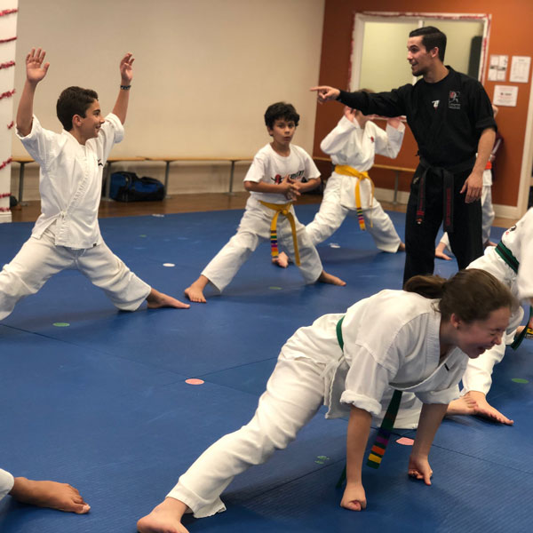 instructor pointing to students